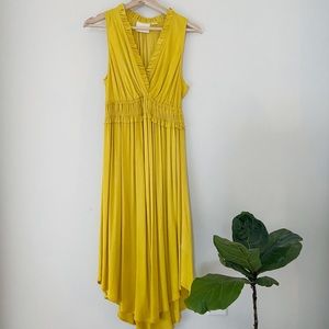 Yellow Anthropologie fitted waist dress
